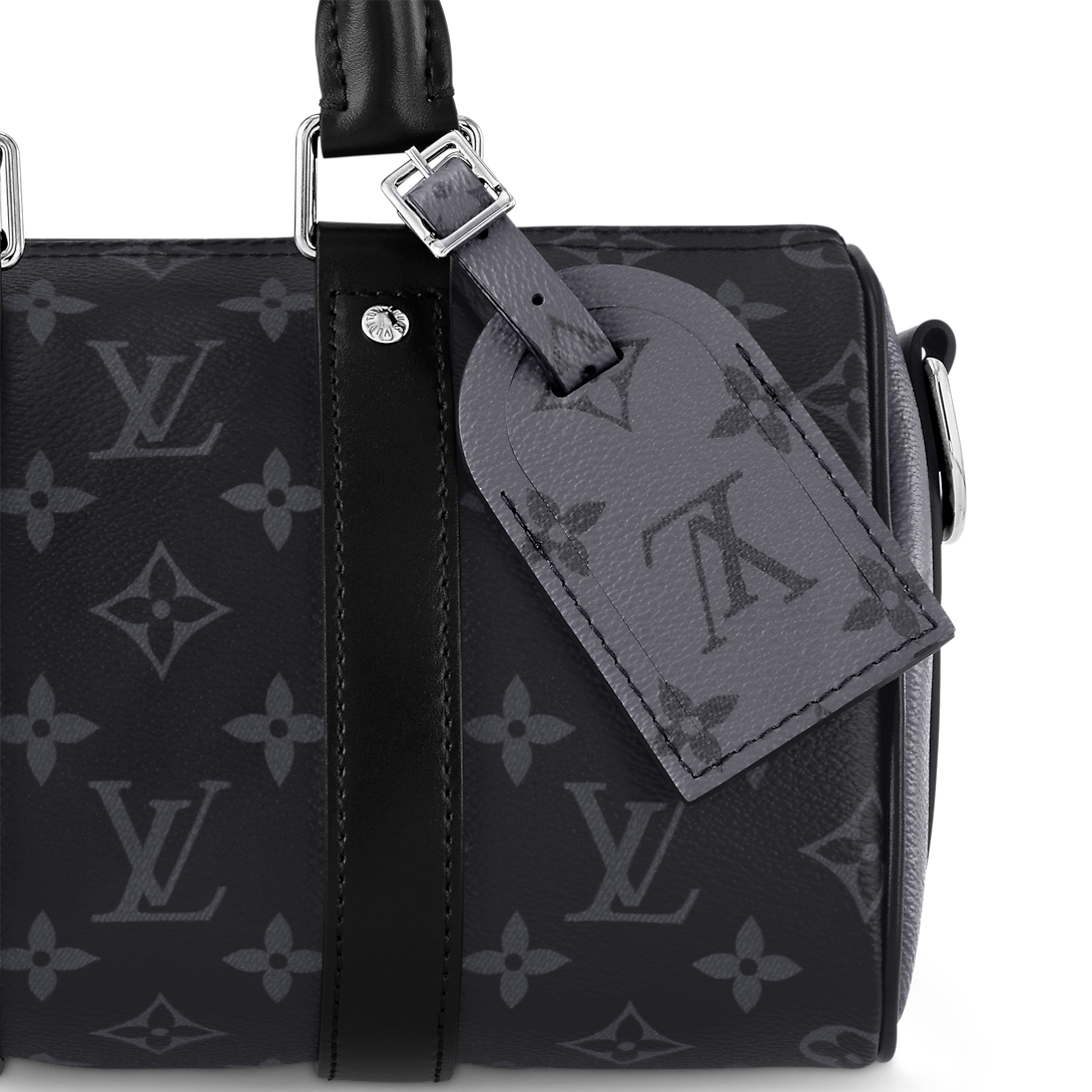 Sac Keepall Bandoulière 25 Louis Vuitton en toile Monogram Eclipse avec finitions en cuir noir