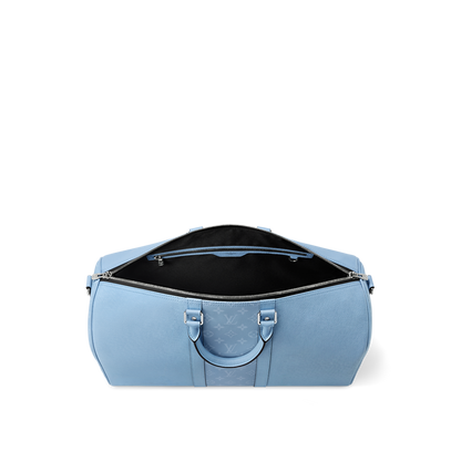 Sac Keepall Bandoulière 50 Louis Vuitton en cuir bleu clair avec bande centrale Monogram
