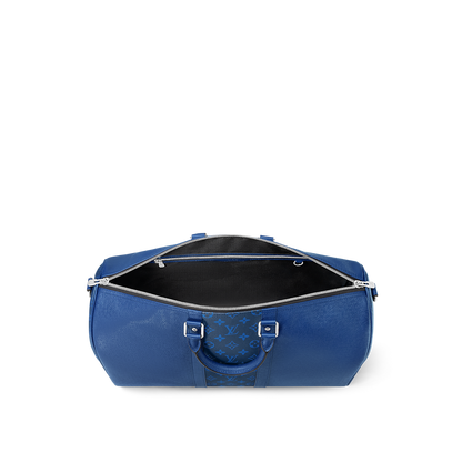 Sac Keepall Bandoulière 50  Louis Vuitton en cuir bleu avec bande centrale Monogram