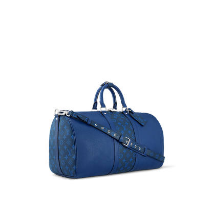 Sac Keepall Bandoulière 50  Louis Vuitton en cuir bleu avec bande centrale Monogram