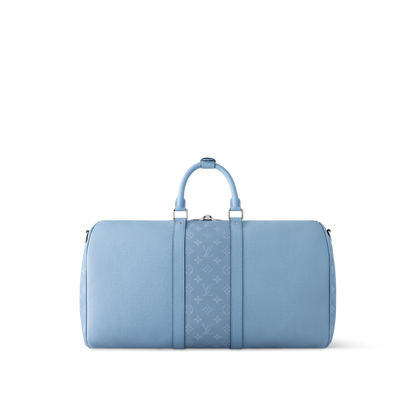Sac Keepall Bandoulière 50 Louis Vuitton en cuir bleu clair avec bande centrale Monogram