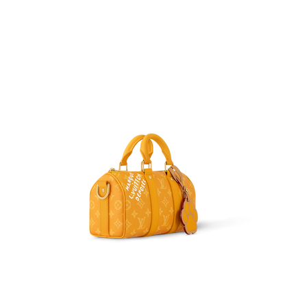 Sac Keepall Bandoulière 25 Louis Vuitton en toile Monogram jaune avec motif chien (collection LV x Animals / Paw)