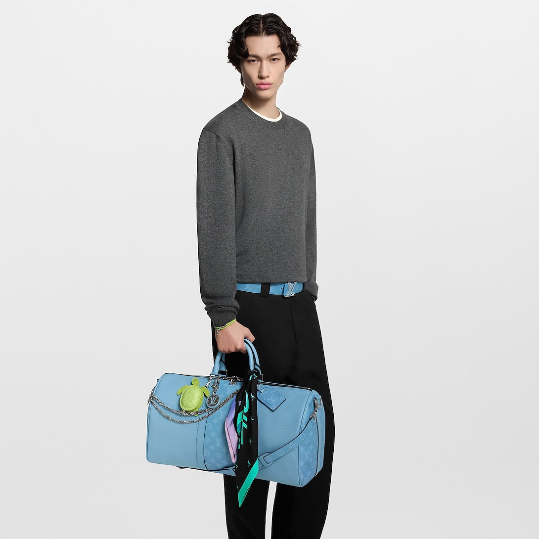 Sac Keepall Bandoulière 50 Louis Vuitton en cuir bleu clair avec bande centrale Monogram