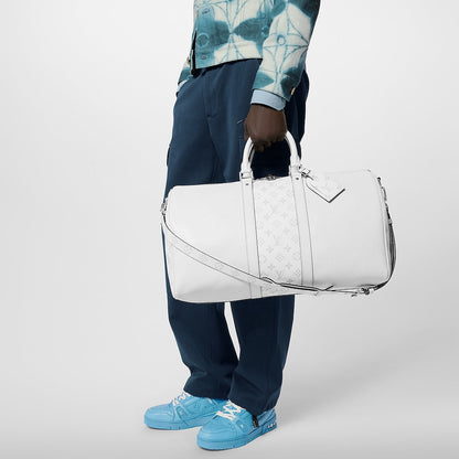 Sac Keepall Bandoulière 50 Louis Vuitton en cuir blanc avec bande centrale Monogram