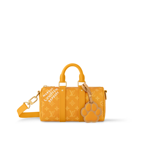 Sac Keepall Bandoulière 25 Louis Vuitton en toile Monogram jaune avec motif chien (collection LV x Animals / Paw)